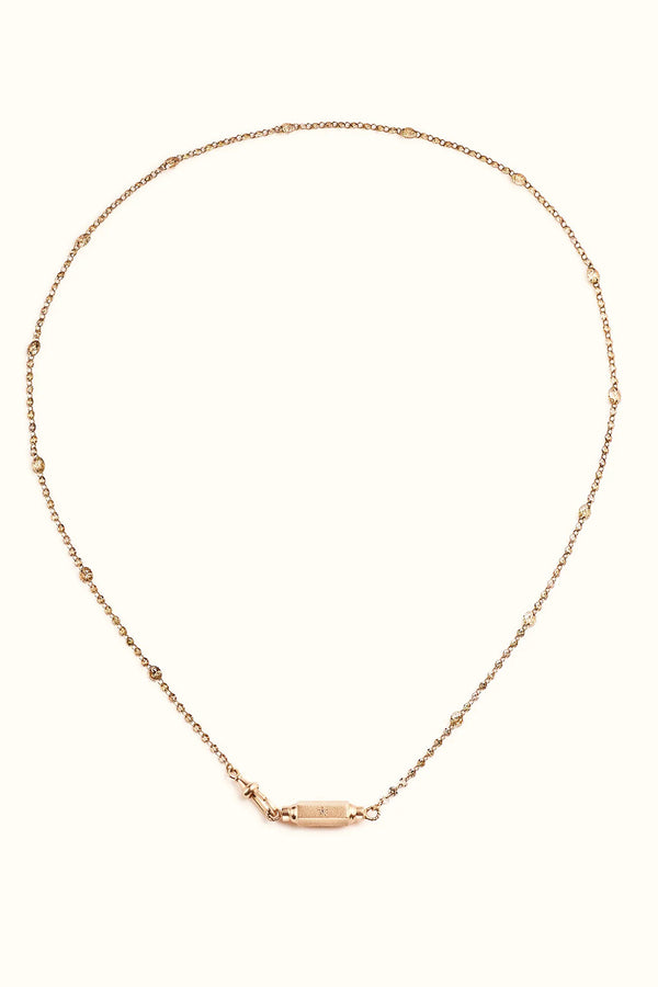 18K ROSE GOLD MICRO COCO LOCKET ON A RIVER DIAMOND CHAIN