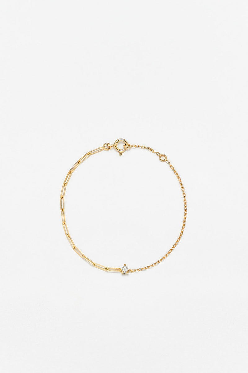 PETITE PEAR CUT SOLITAIRE DIAMOND AND 18K YELLOW GOLD MIXED CHAIN BRACELET